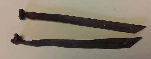 Training jesses.  Note the slit.  These jesses are made of kangaroo leather and have been dyed brown.